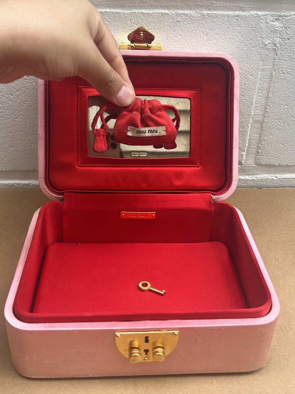 Miu Miu Pink Exterior with Red Velvet Interior Jewelry Box with key & pouch.